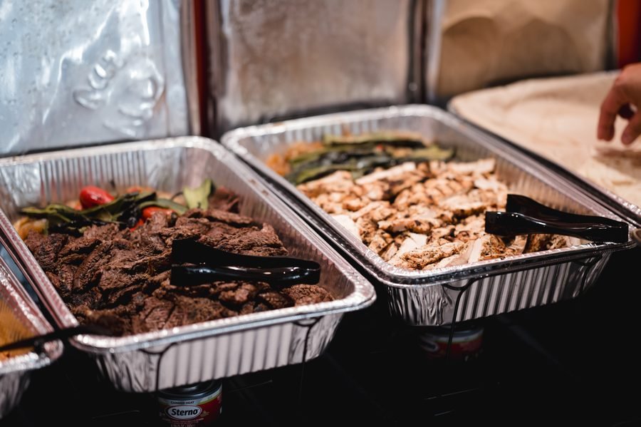 Catered fajita spread laid out for an event at Birdie Central